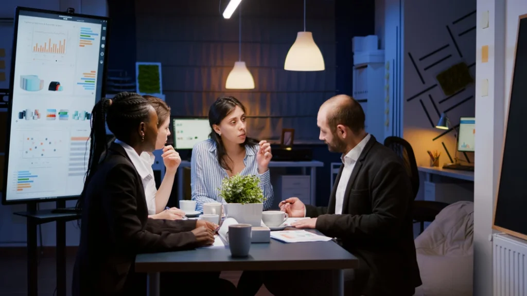 Team in modern office collaborating on a strong business plan for 2025